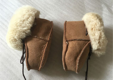 Chine Chaussures de bébé véritables de peau de mouton, bottes d'hiver pour le nourrisson/enfant en bas âge fournisseur