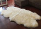 Blanc en ivoire durable fait main 120 *180cm de grande couverture australienne de peau de mouton de quatre peaux fournisseur