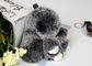 Astuces de couleur de noir de Keychain de fourrure de lapin/blanches mignonnes pelucheuses faites main fournisseur
